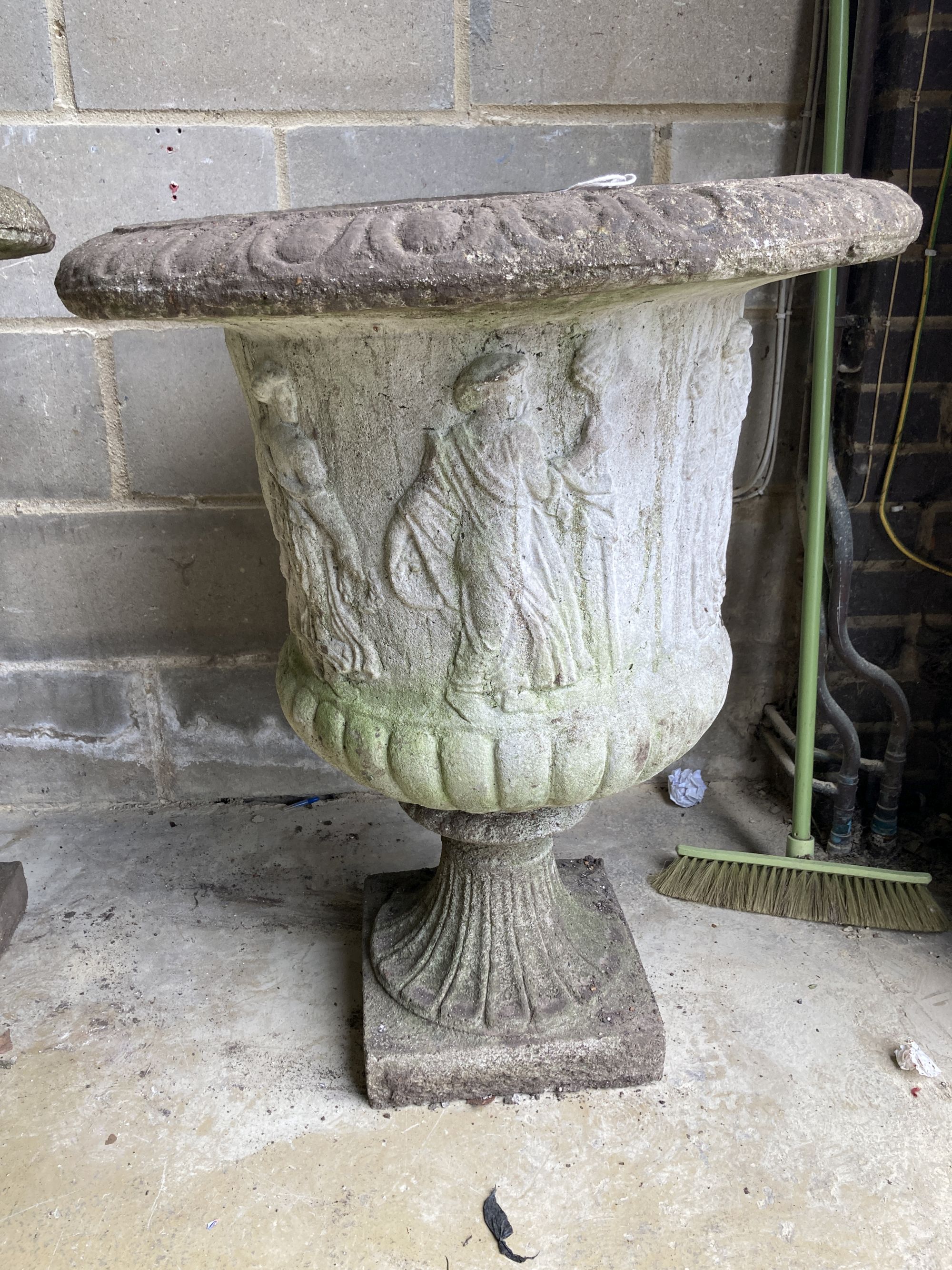 A near pair of reconstituted stone campana garden urns, larger 66cm diameter, height 85cm